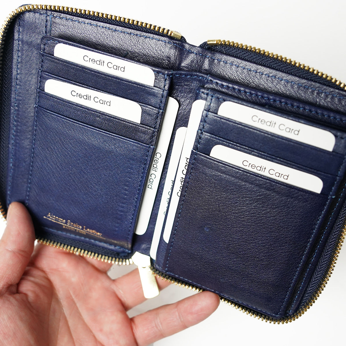 Indigo dyed x snake leather round zipper half wallet HRD2001