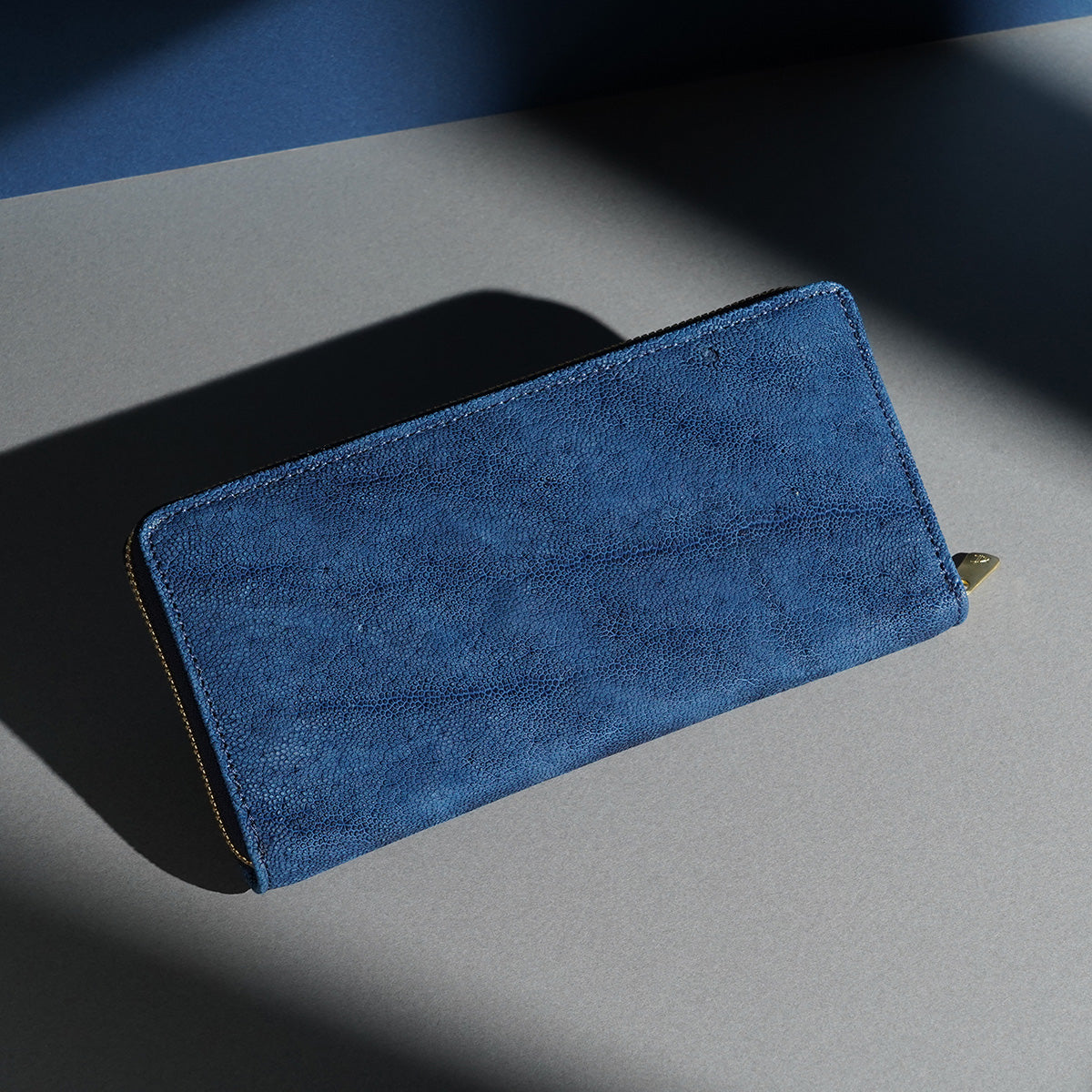 Indigo dyed x elephant leather round zipper long wallet HRD1000